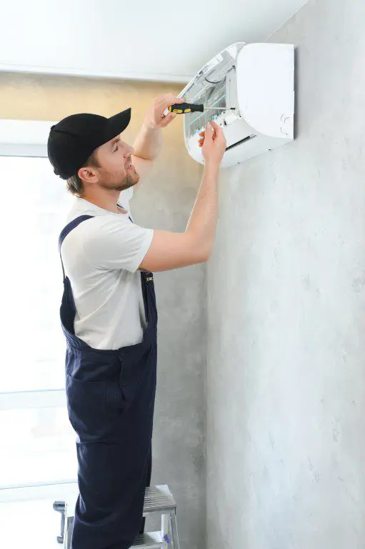 service-man-is-cleaning-repair-and-maintenance-of-2026-03-24-05-27-37-utc (1)